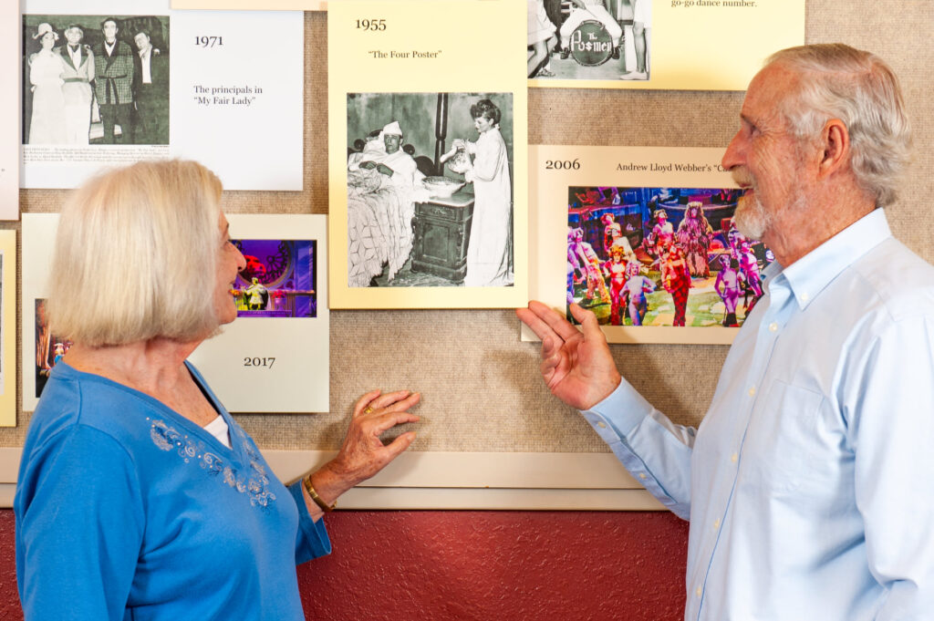Susan and randall Morning share a look at a photo of susans parents john and rosemary greene in one of OCTs earliest productions